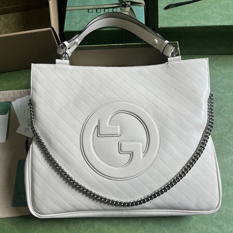 G*u*i top handle bags